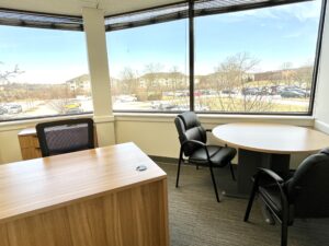 office with a desk and table